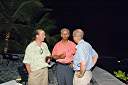 Cele's surprise birthday party at Brandywine Bay - chef Andy and chef Mike talking with Chief Minister Dr. Orlando Smith.