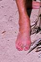 Toes at Eugene's beach bar at Smuggler's Cove.