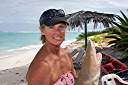 Nancy's laughing lemon shark. She is tickling it's belly.