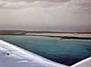 Flying into Anegada on Island Birds. Cow Wreck is visible on far side of Anegada.