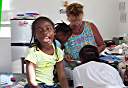 Preparing to dye Easter eggs with Trayesha, Janesha, and Lakesha.