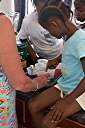 Dyeing Easter eggs with Trayesha, Janesha, and Lakesha.