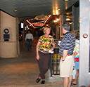 Standing in front of the Bull Ring, having a Shiner Bock from the White Elephant.
