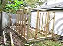 Foundation beam in place and framing just started.  All wood is pressure treated.
The outside dimensions are 16 feet x 7 feet.  The walls are 74 inches high above the foundation beam. Pavers are under the foundation beam to keep it above ground.  The pavers have not been leveled yet.