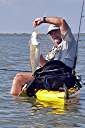 25 inch redfish. Caught on Berkley Gulp shrimp - natural color, rigged on Rockport Rattler jig head. Fish weighed six pounds.