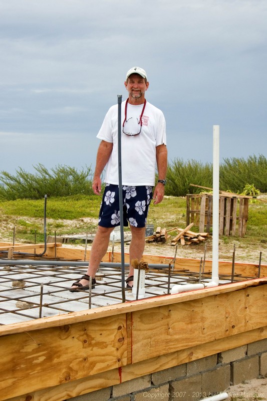 Walker in bathroom of "Hidden Treasure" - the cottage that we are building at Cow Wreck Beach.