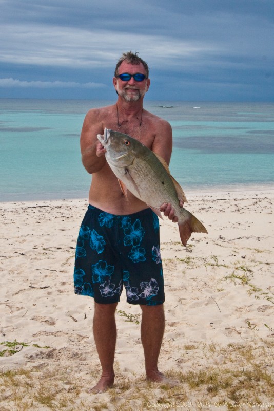 Walker with 10 pound mutton snapper caught in our front yard.