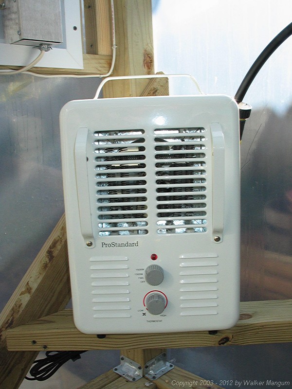 The simple heater. $17.00 at Lowe's. Although rated the same as the original Black and Decker heater, this unit seems to put out more heat, and cost less than half as much. It is controlled entirely by the greenhouse heater control circuit.