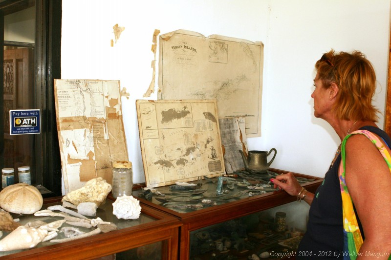 Nancy studying old maps at the Anegada Beach Museum.