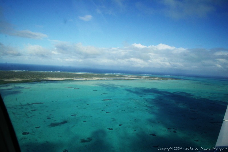 Leaving Anegada -- looking over east end of Anegada. Horseshoe Reef extends to the right.